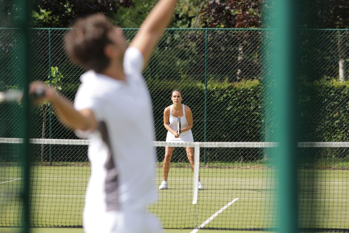 couple playing tennis, runnymede on thames