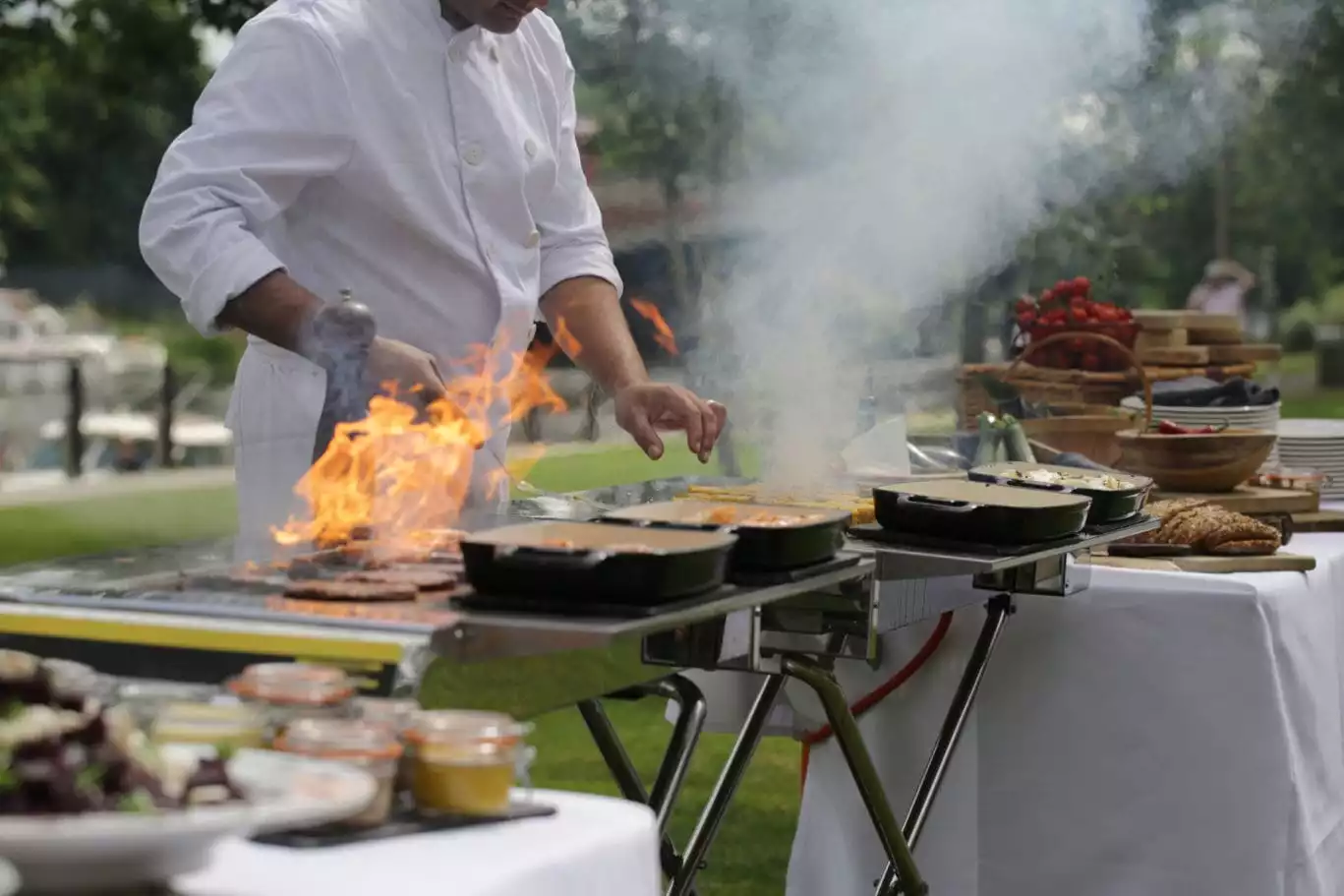 chef preparing bbq on the terrace, runnymede on thames