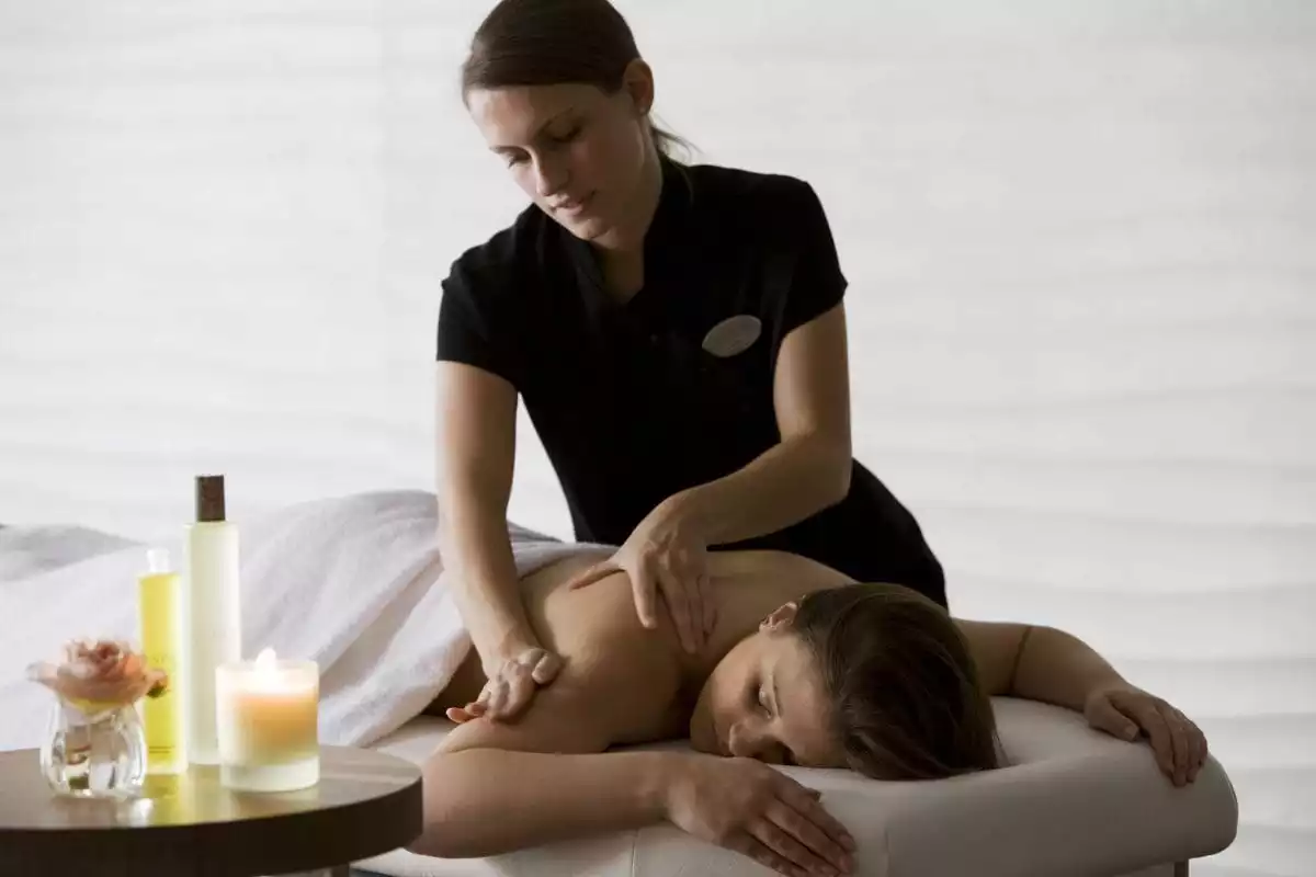 Massage therapist giving massage, The Spa at The Runnymede on Thames